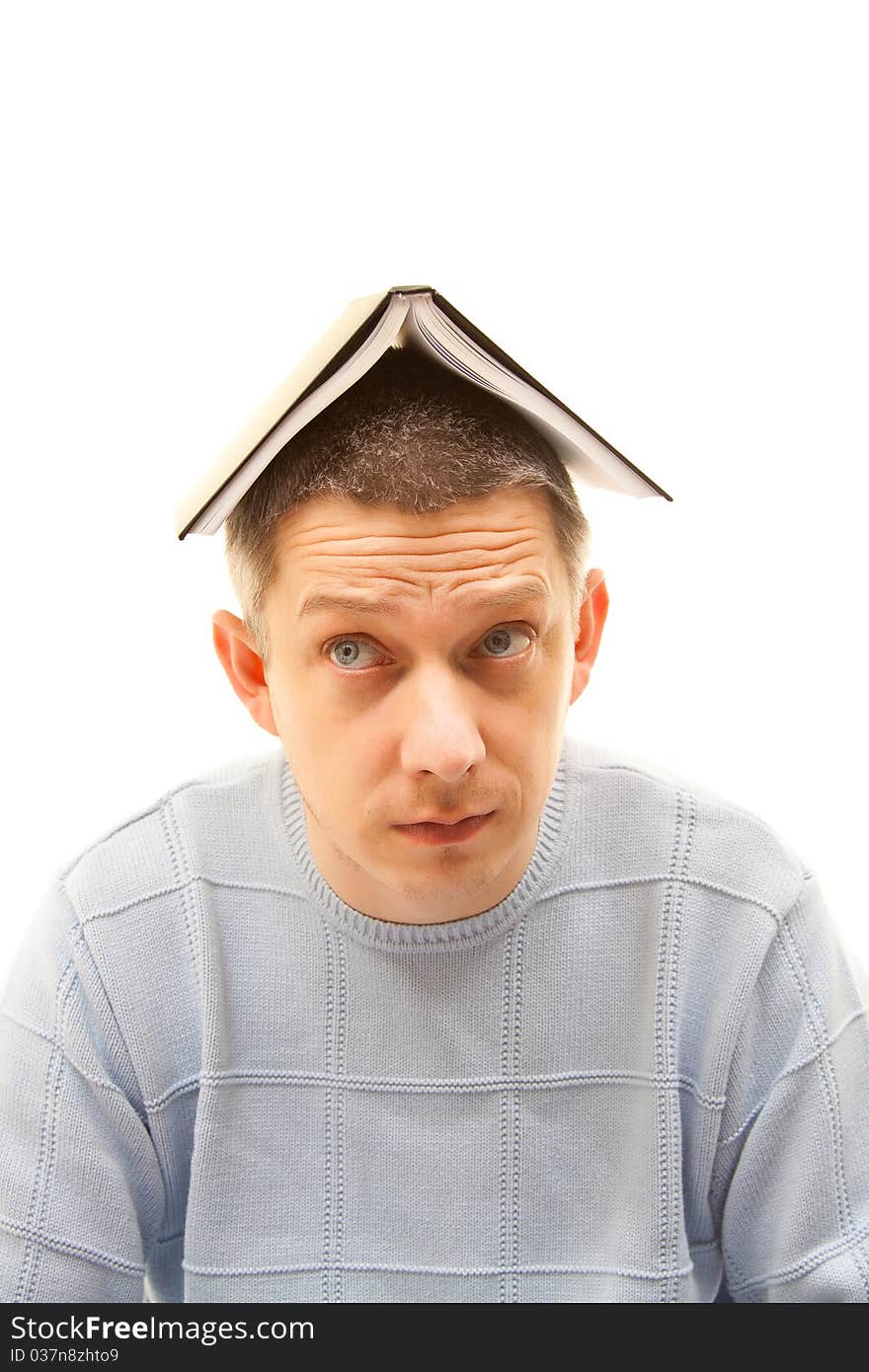 Man with a book above head