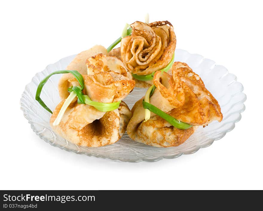 Pancakes on a plate isolated on white background