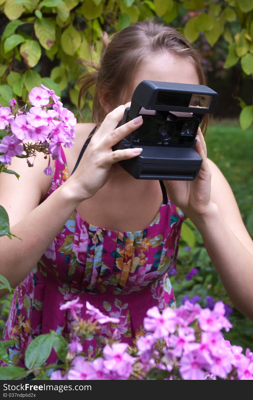 Girl with old-fashioned camera