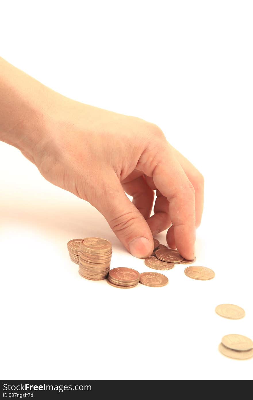 Golden coins in man's hand isolated on white background