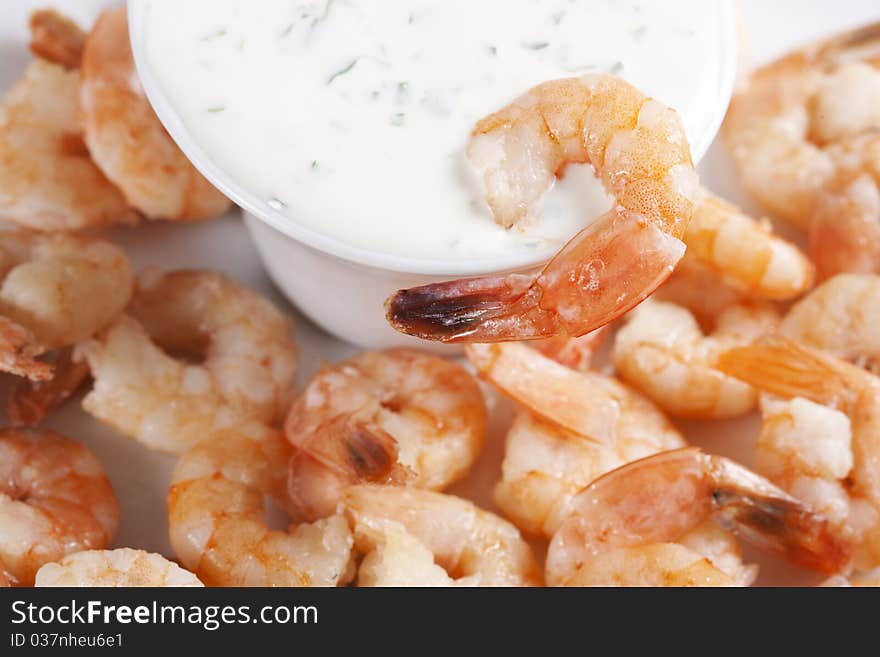 Fried shrimps on a plate and sauce