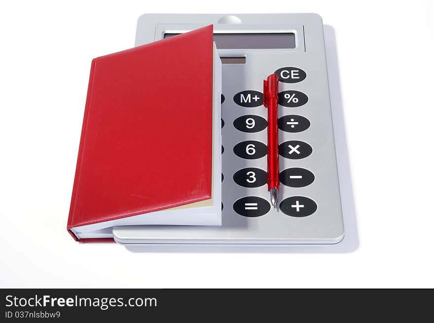 Great calculator and red notebook for reference daily notes with a pen on a white background