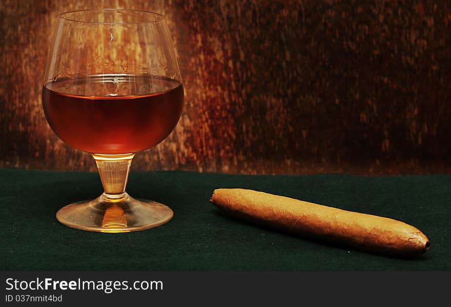 Cigar and a glass of alcohol