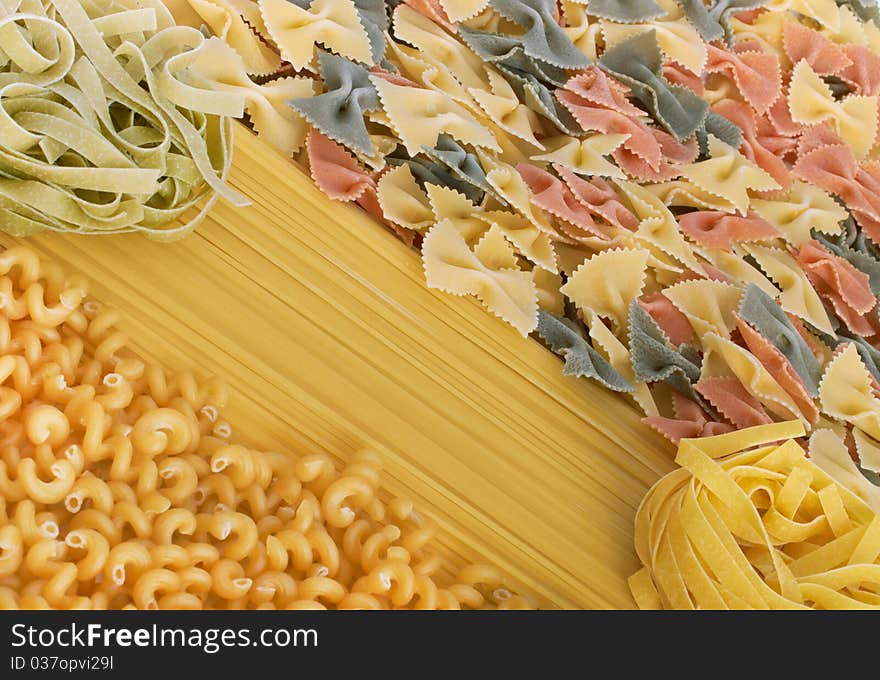 Italian pasta spagetti, tagliatelle fusilli and farfalle. Italian pasta spagetti, tagliatelle fusilli and farfalle