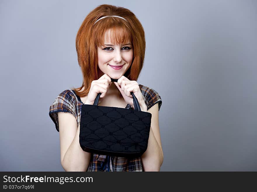 Girl in american 50s-60s style with handbag. Girl in american 50s-60s style with handbag.