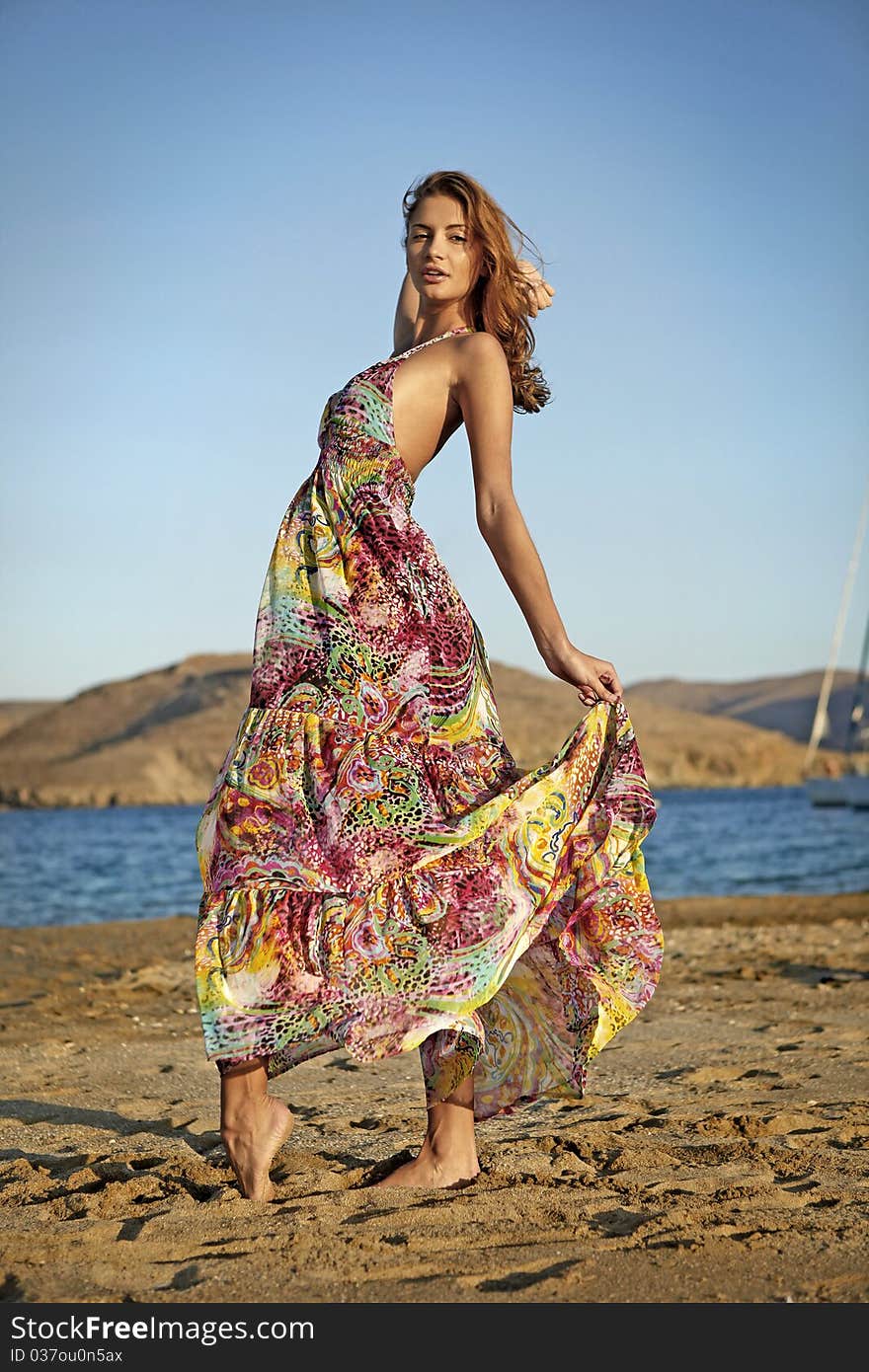 Goddess of the wind dance on the beach