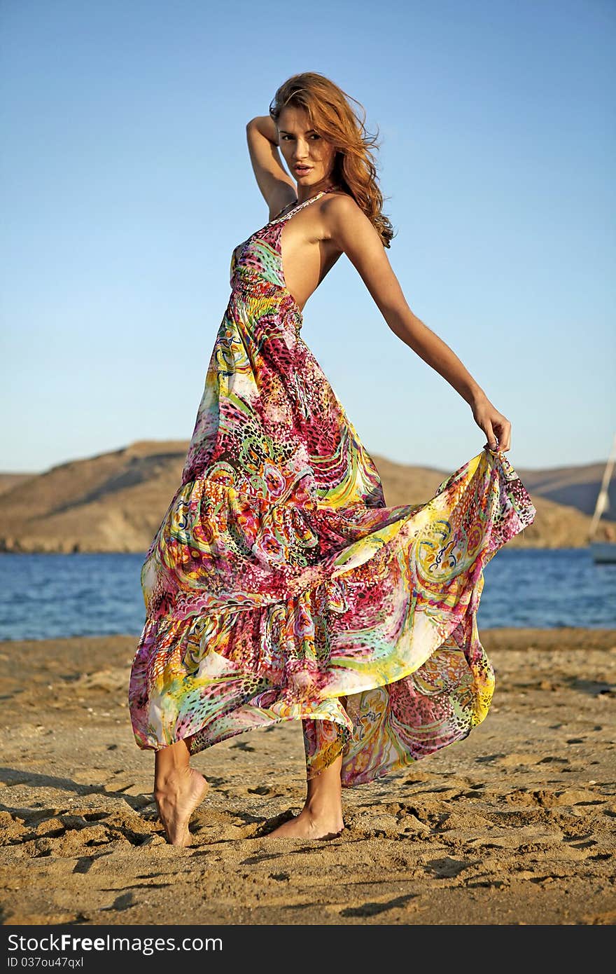 Goddess of the wind dance on the beach