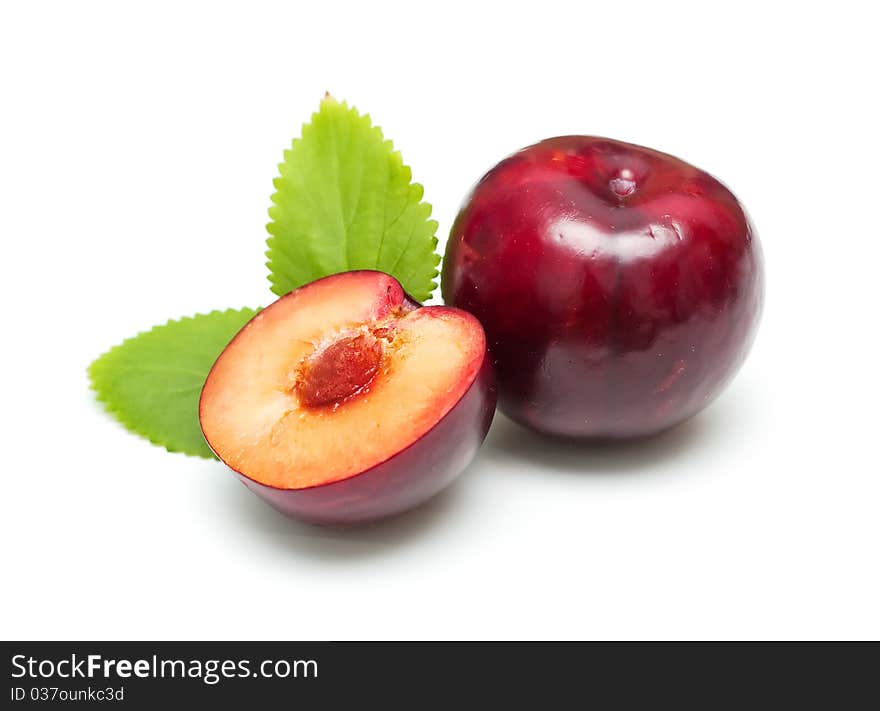 Plums isolated on white