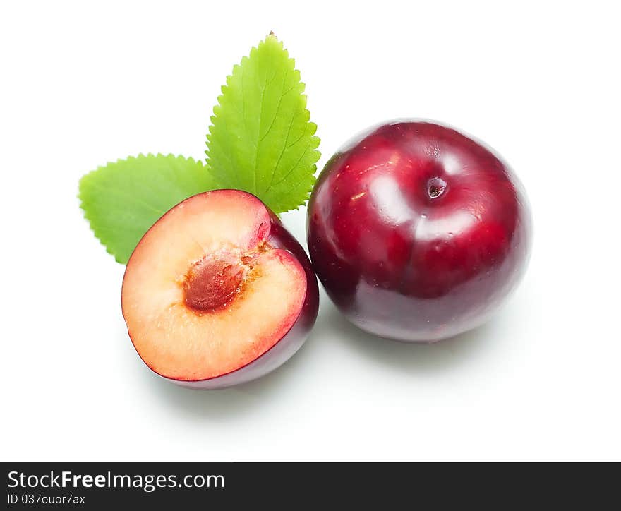 Plums isolated on white