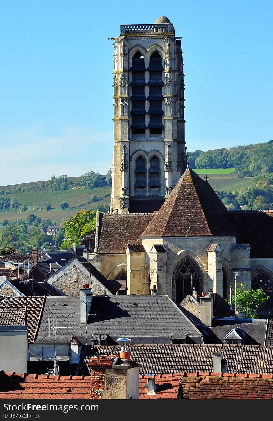 High bell tower of a church in Champagne