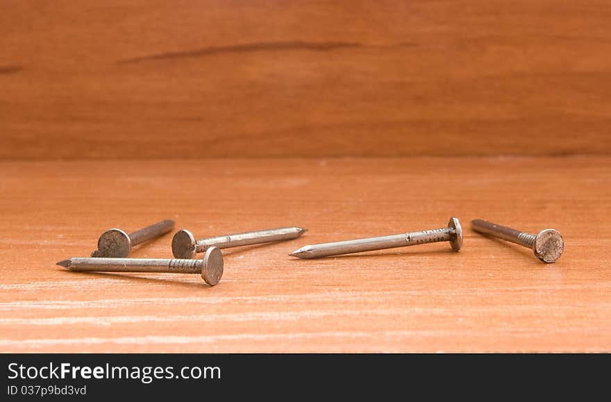 Nails on the wooden workshop table