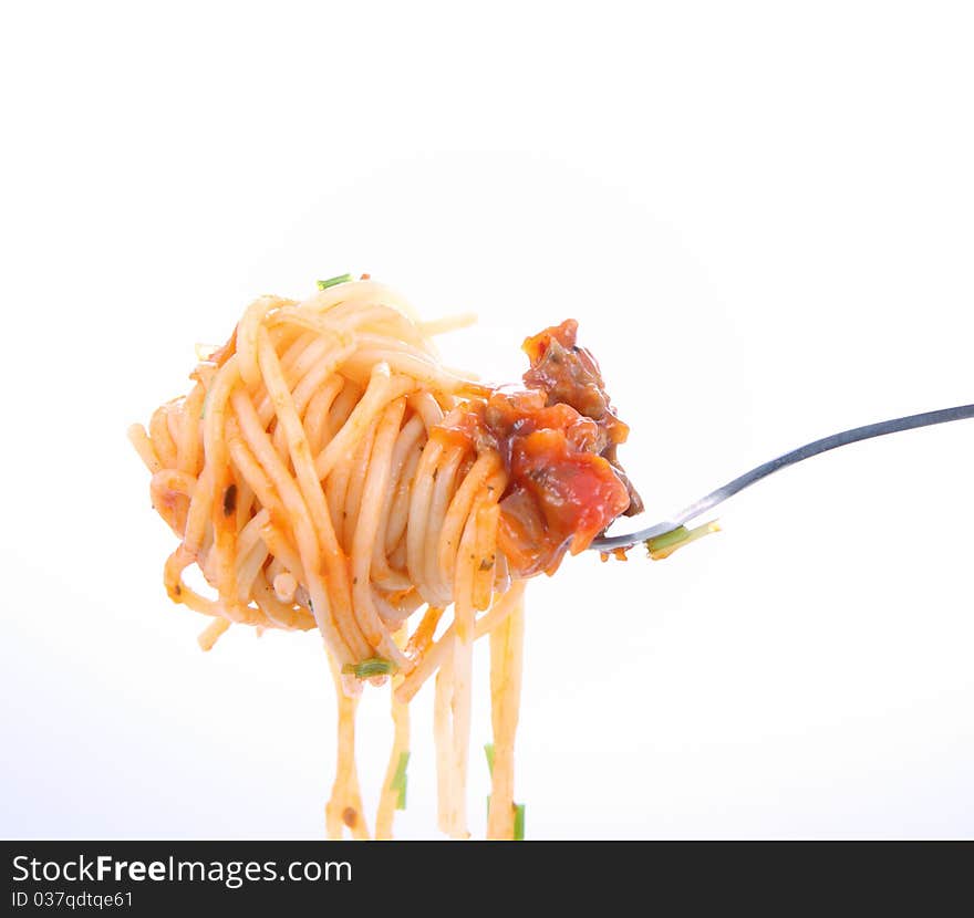 Spaghetti bolognese on fork