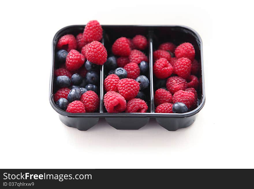 Raspberry And Blueberry In Packing