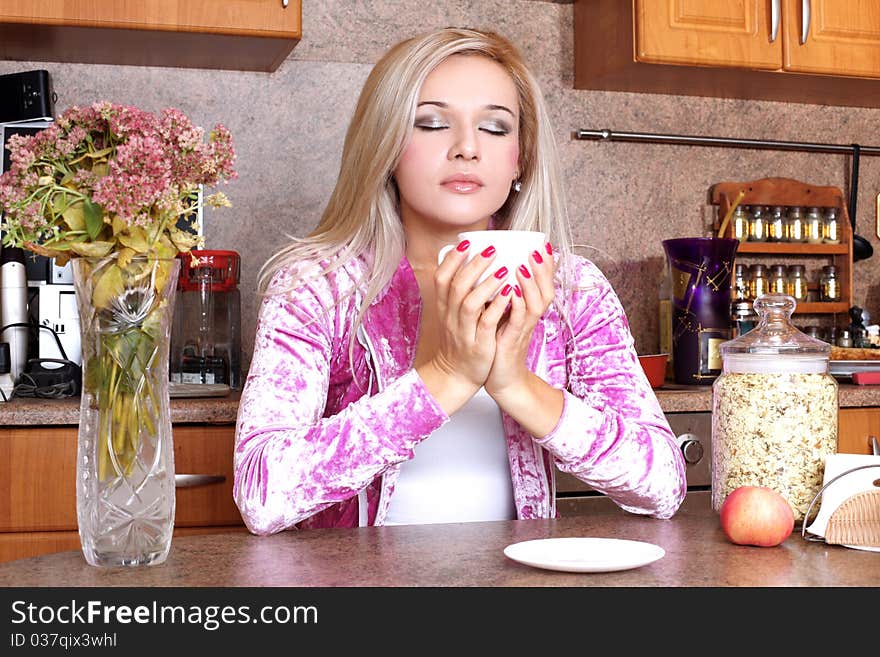 Woman sniffing the scent cup