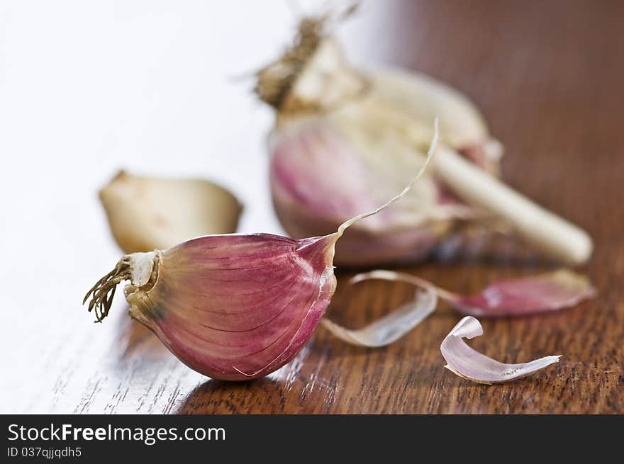 Garlic on wood table closeup