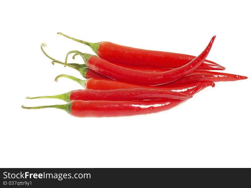 Red hot chili peppers on white background