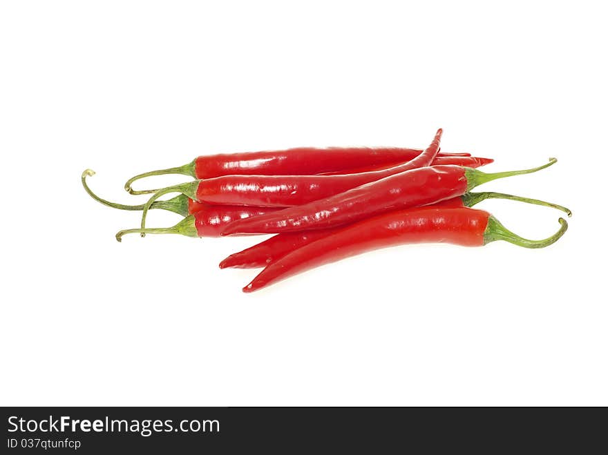 Red hot chili peppers on white background