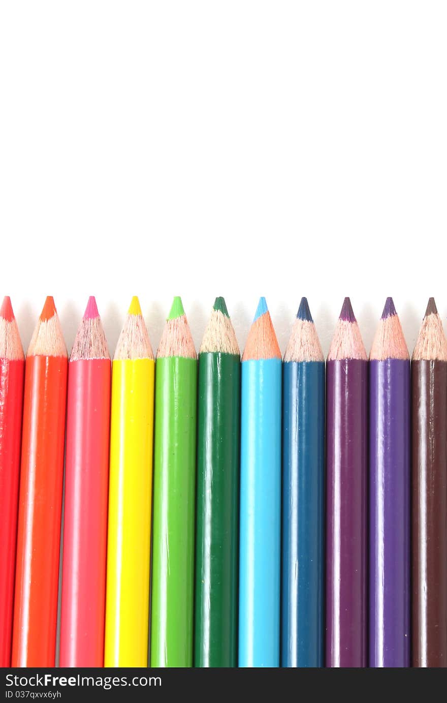 Colorful pencils with white space above