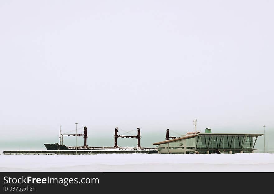 The ship with snow-covered port