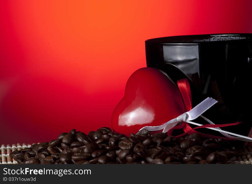 Coffee cup, heart and coffee beans. Coffee cup, heart and coffee beans