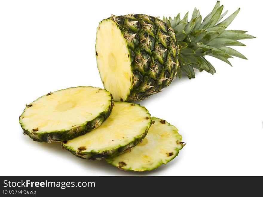 Fresh cutted pineapple isolated on white background