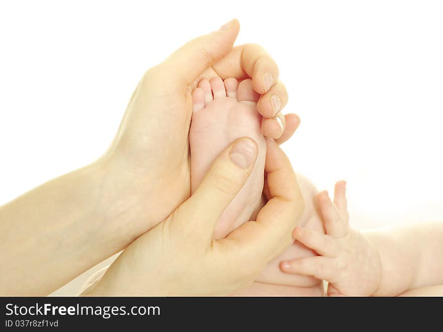 Newborn baby feet isolated on white