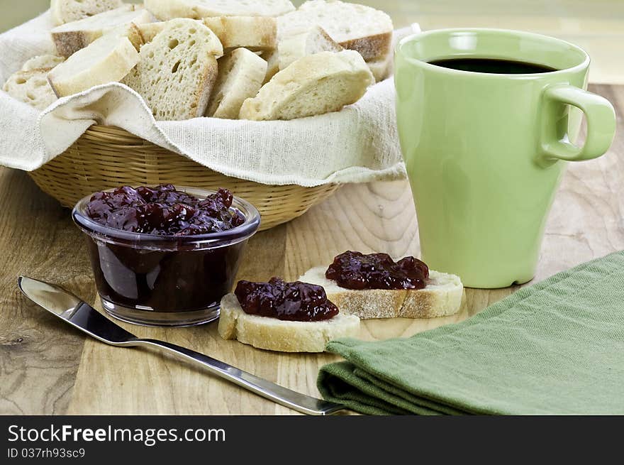 Fresh baked bread with jam and coffee. Fresh baked bread with jam and coffee