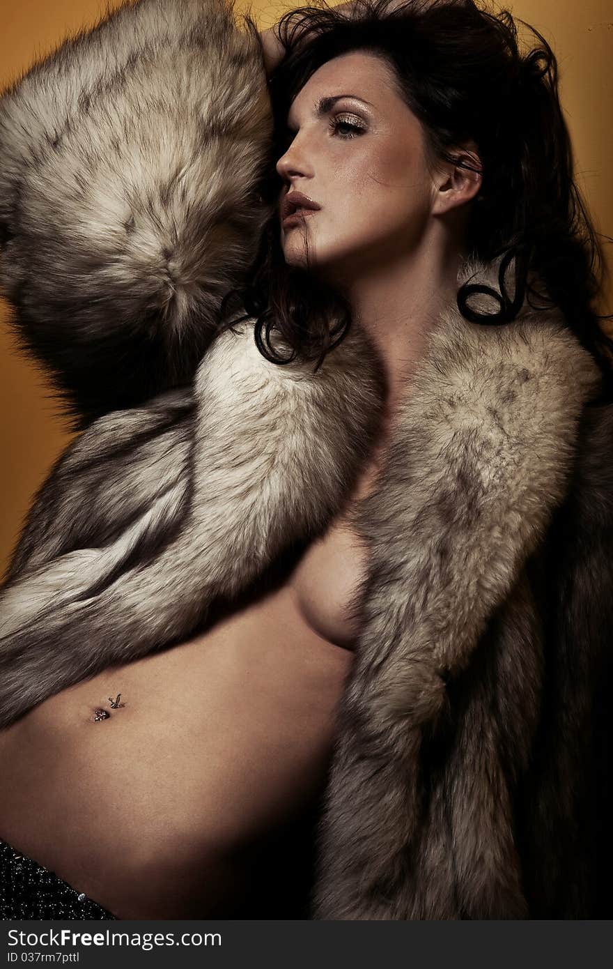 Young woman wearing fur. Young woman wearing fur