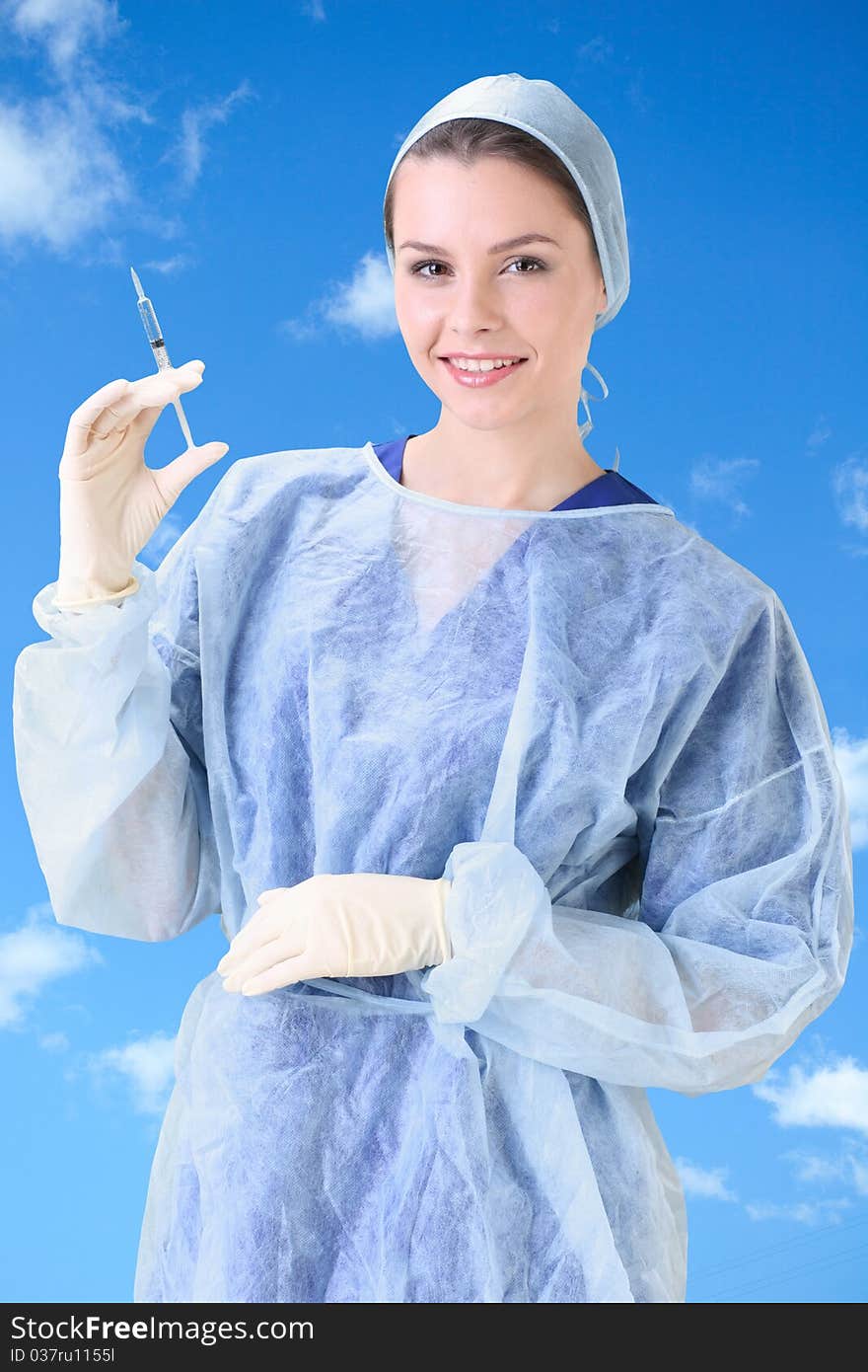 Young working beautiful woman doctor in uniform