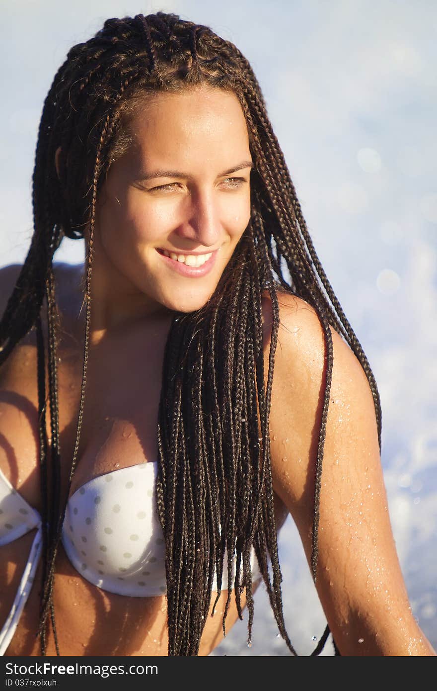 Young tanned girl looking to the horizon. Young tanned girl looking to the horizon