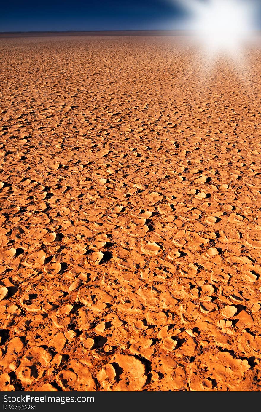 Dry cracked dirt surface of verneukpan, a large saltpan in south africa