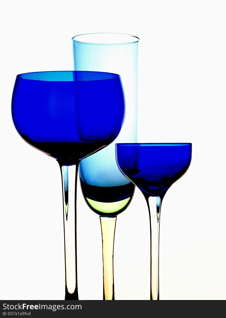 Abstract  glassware background design of wine glasses on white background. Abstract  glassware background design of wine glasses on white background.