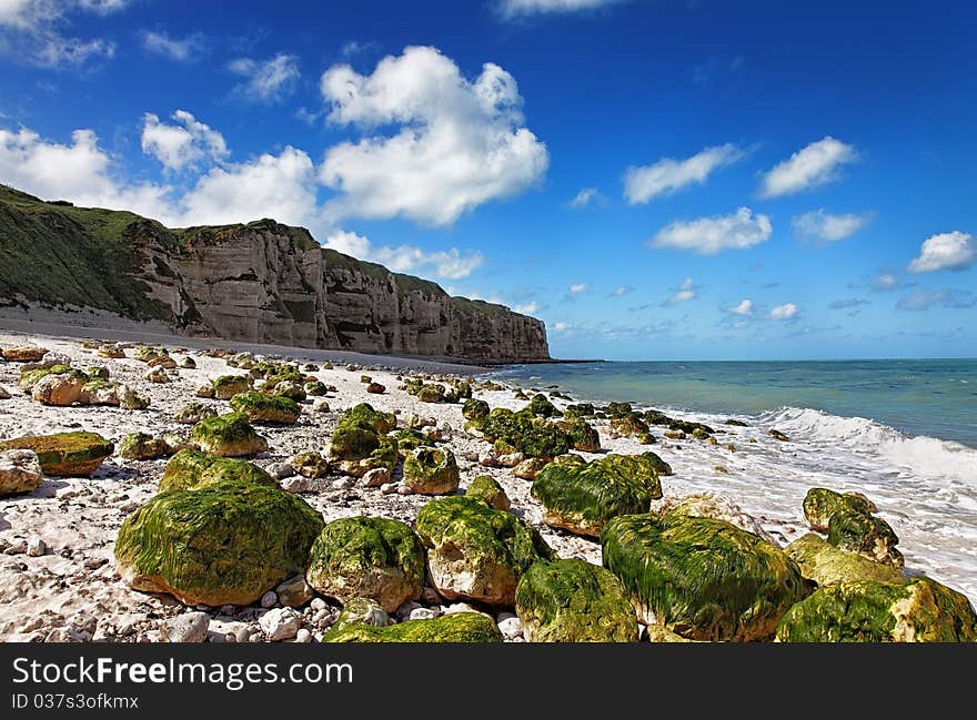 Image of the rocky beach from Le Tileul in the Upper Normandy in the North of France. Image of the rocky beach from Le Tileul in the Upper Normandy in the North of France.