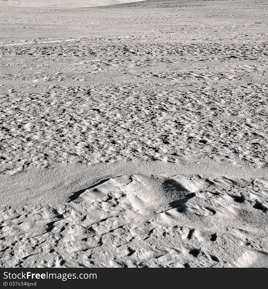 Field full of snow, exposed grey to get illusion of moonscape.