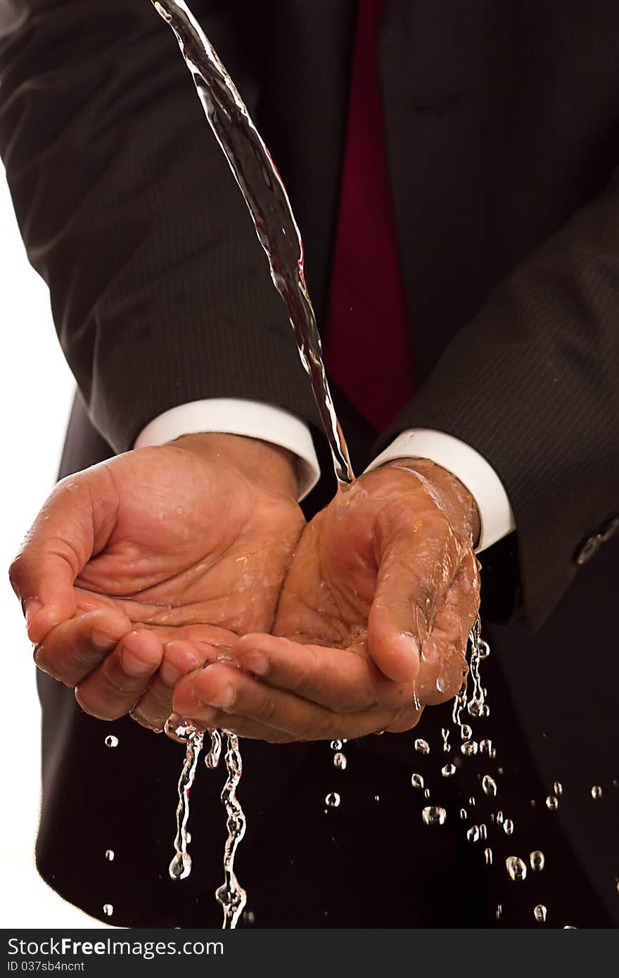 Water flowing through hands for cleansing. Water flowing through hands for cleansing