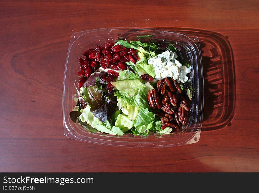 Fancy salad with nuts, blue cheese and cranberries. Fancy salad with nuts, blue cheese and cranberries.