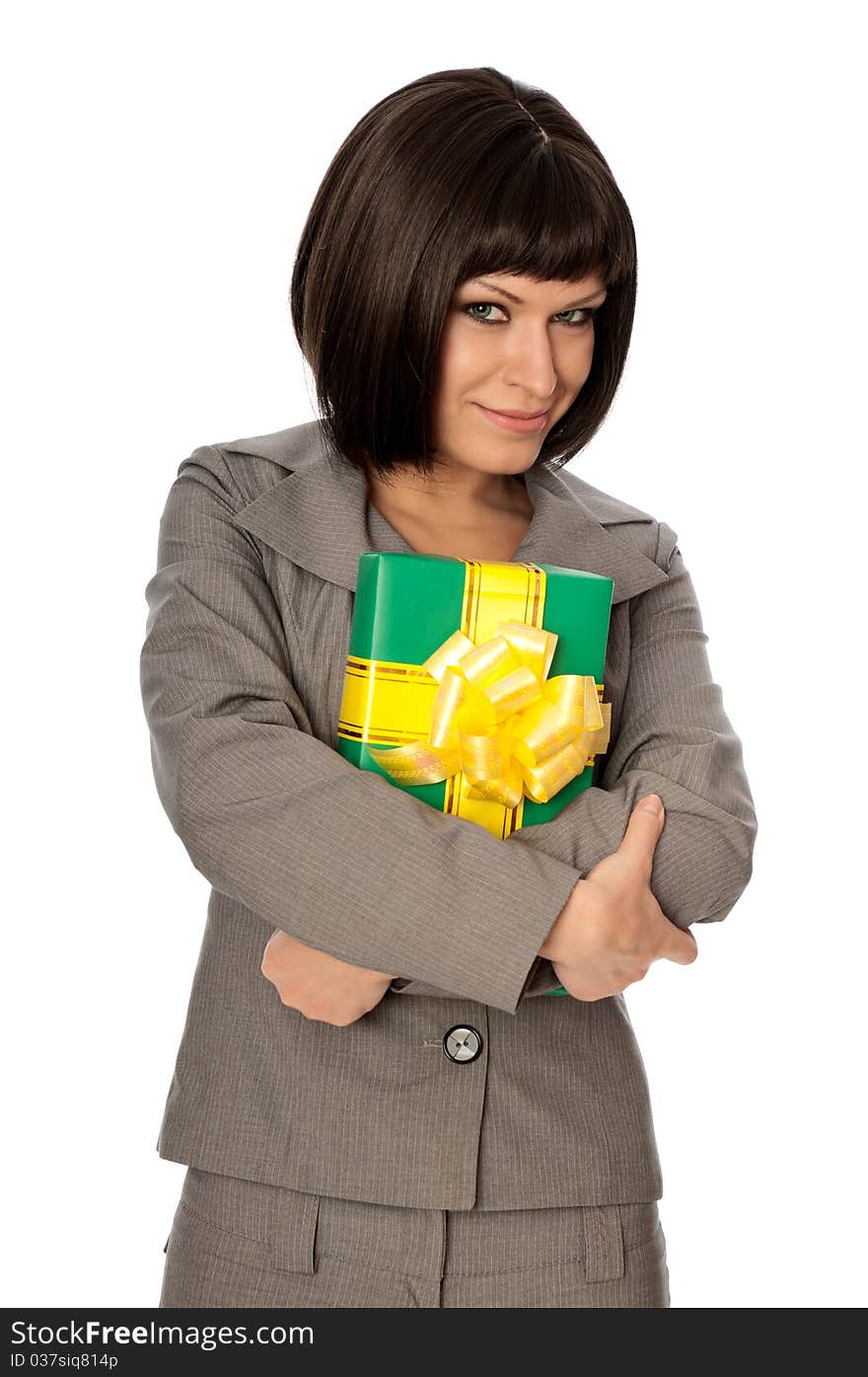 Woman holding a green box with yellow bow as a present. Woman holding a green box with yellow bow as a present