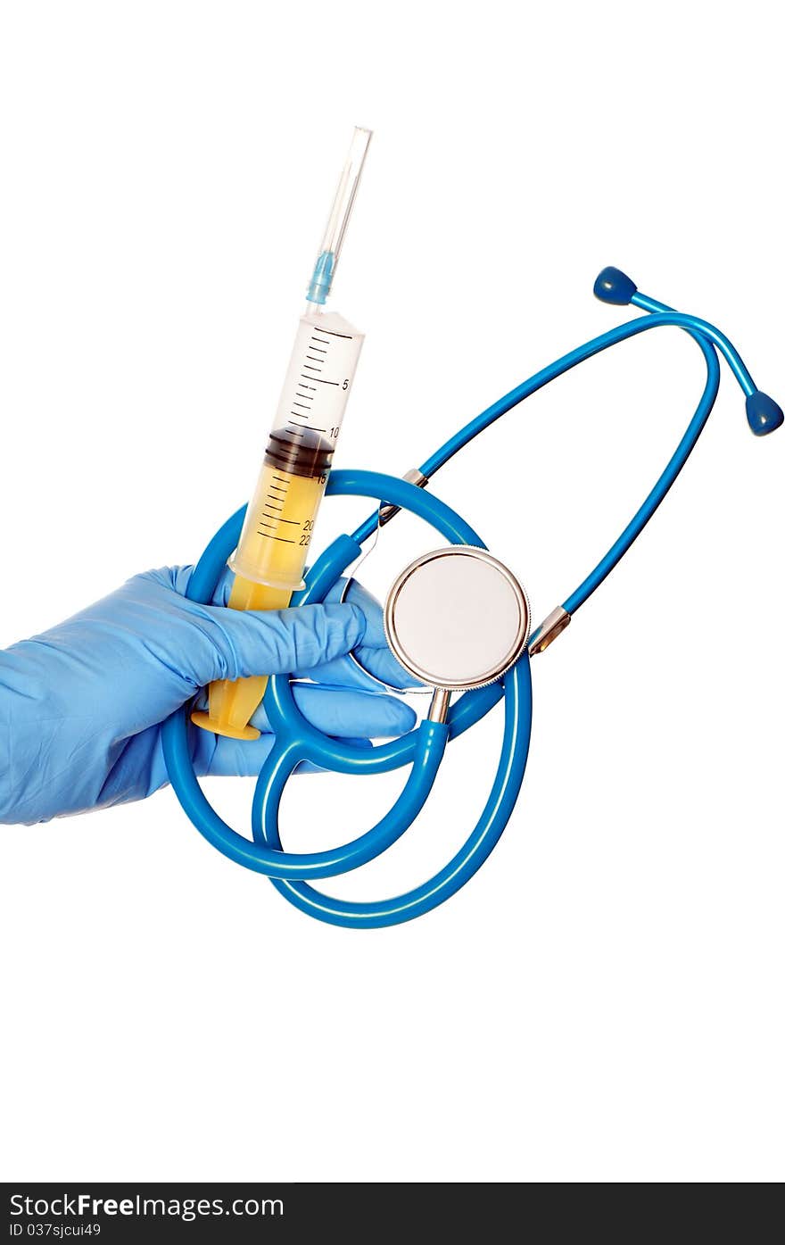 The doctor holding a blue stethoscope and yellow syringe in the hand