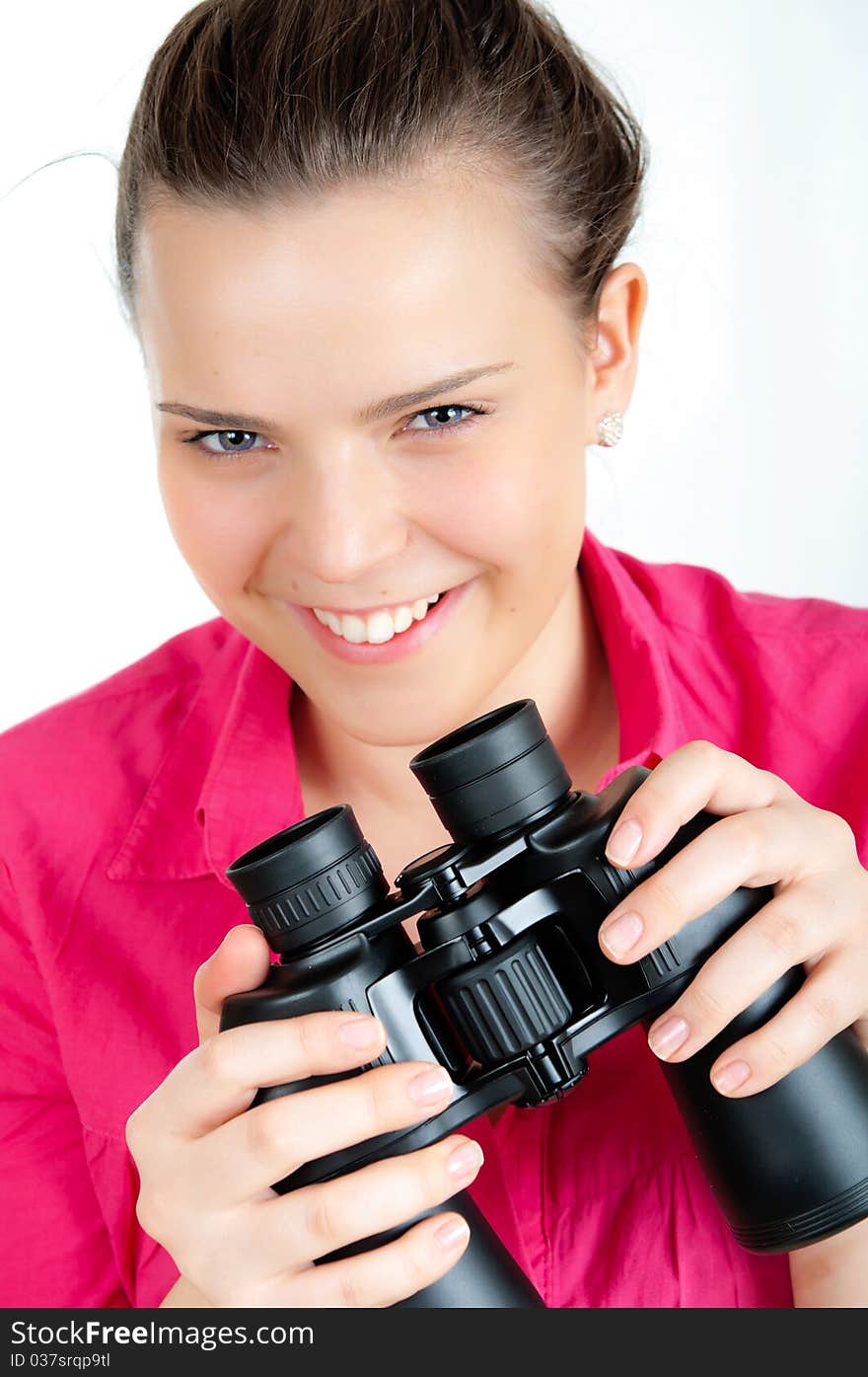 Surprised girl with binoculars on white. Surprised girl with binoculars on white