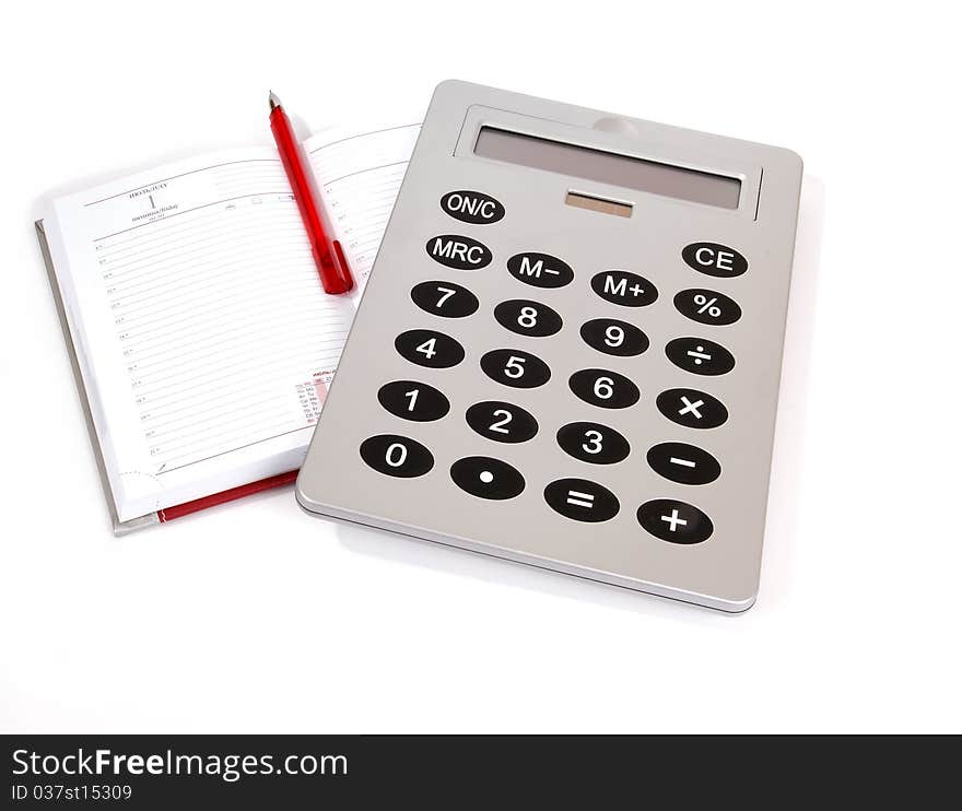 Great calculator and notebook for reference daily notes with a pen on a white background