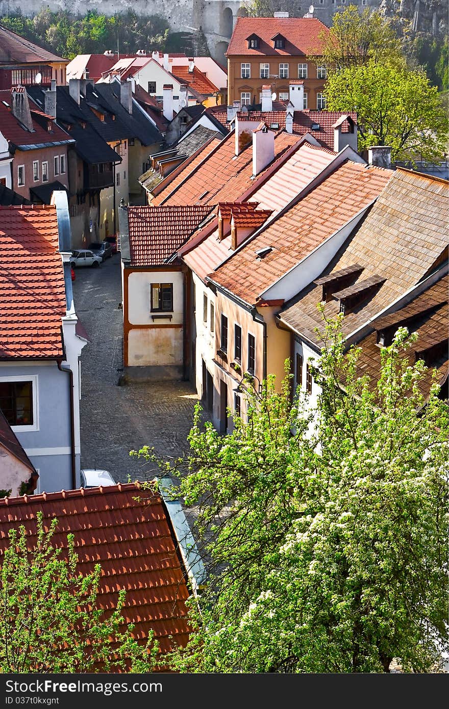 The top view on medieval street. Cesky Krumlov (German: Bohmisch Krummau). Southern Czechia. The top view on medieval street. Cesky Krumlov (German: Bohmisch Krummau). Southern Czechia