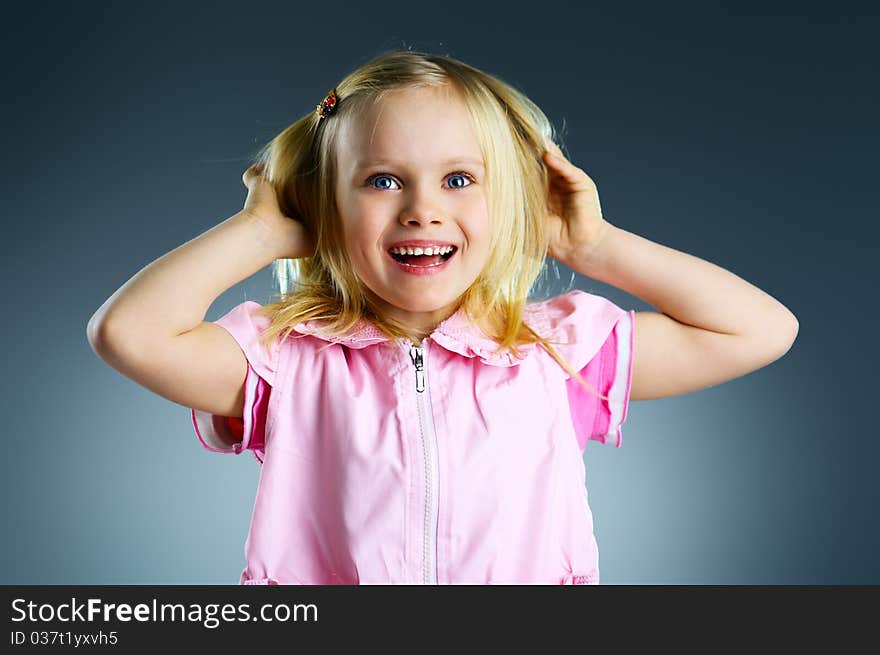 The portrait of a beautiful little girl. The portrait of a beautiful little girl.