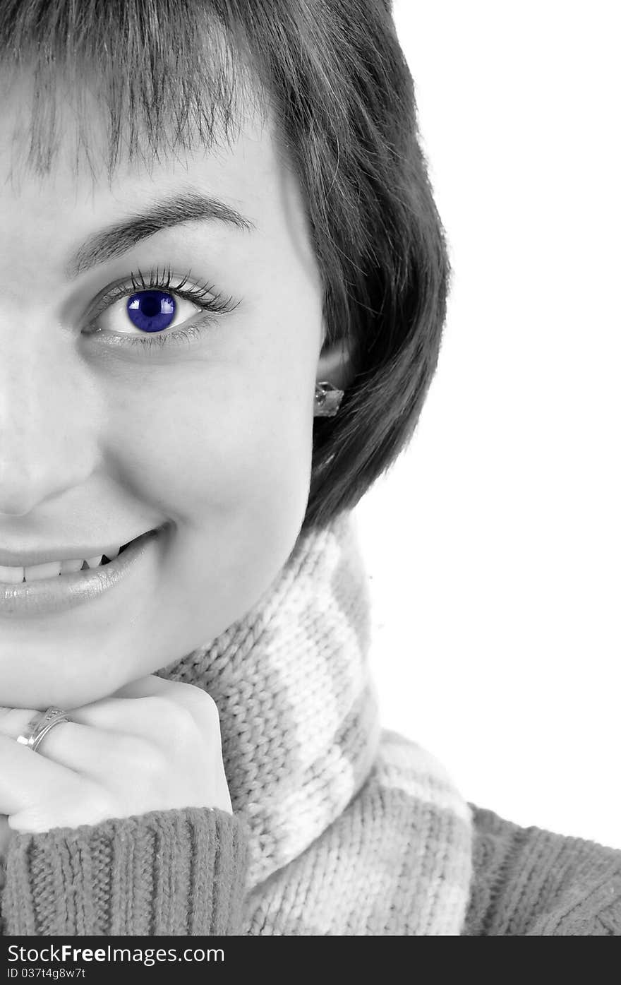 Smiling young woman on black-white with blue eye