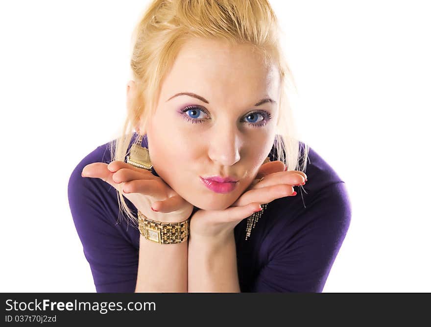 Studio portrait of blonde woman with blue eyes