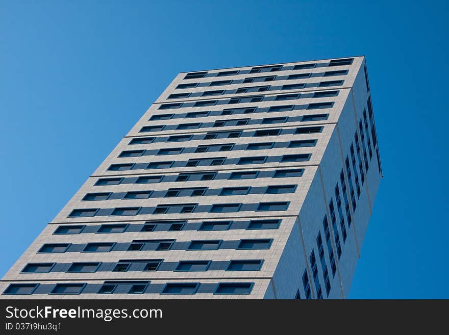 High skyscraper with blue sky