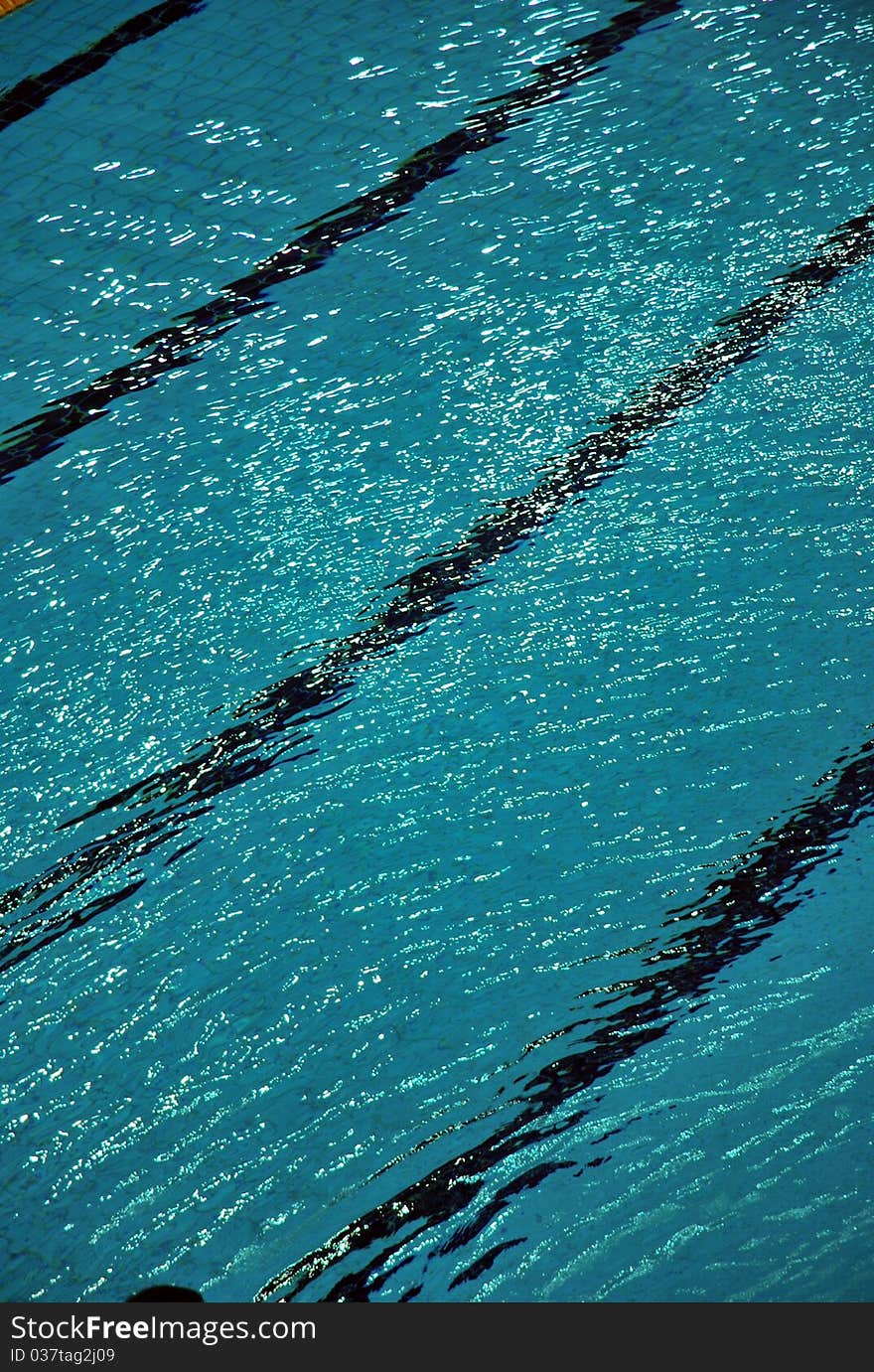 Black lane lines at bottom of the swimming pool in the National Aquatic center, Beijing, China. Black lane lines at bottom of the swimming pool in the National Aquatic center, Beijing, China