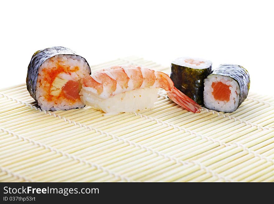 Delicious maki sushi with salmon, shrimp, cheese and caviar. Traditional Asian food. Delicious maki sushi with salmon, shrimp, cheese and caviar. Traditional Asian food.