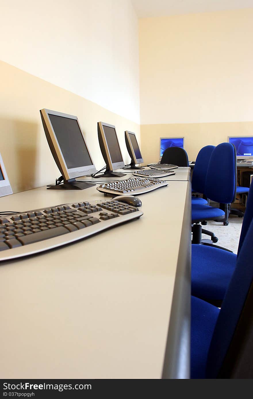 Desktop of office with computer and keyboard