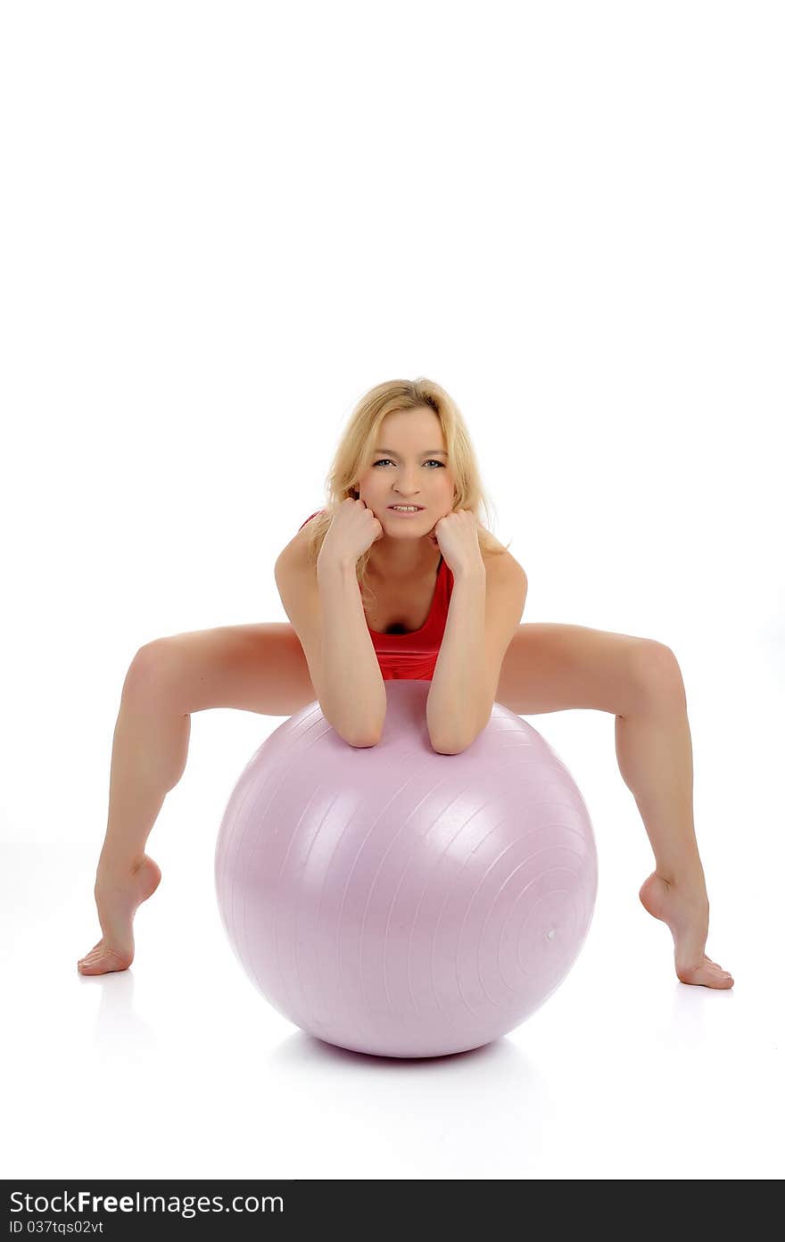 Pretty sporty fitness woman doing exercise with pilates ball. isolated over white. Pretty sporty fitness woman doing exercise with pilates ball. isolated over white
