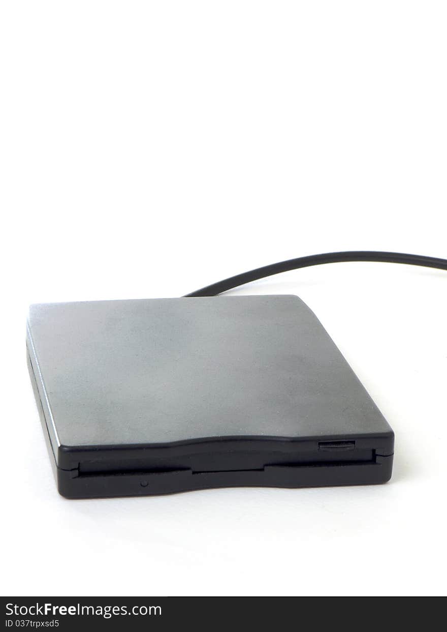 A black external usb floppy disk drive, isolated on white background. A black external usb floppy disk drive, isolated on white background